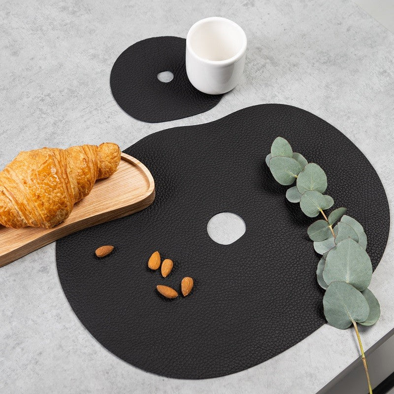 Black leather placemat and coaster set