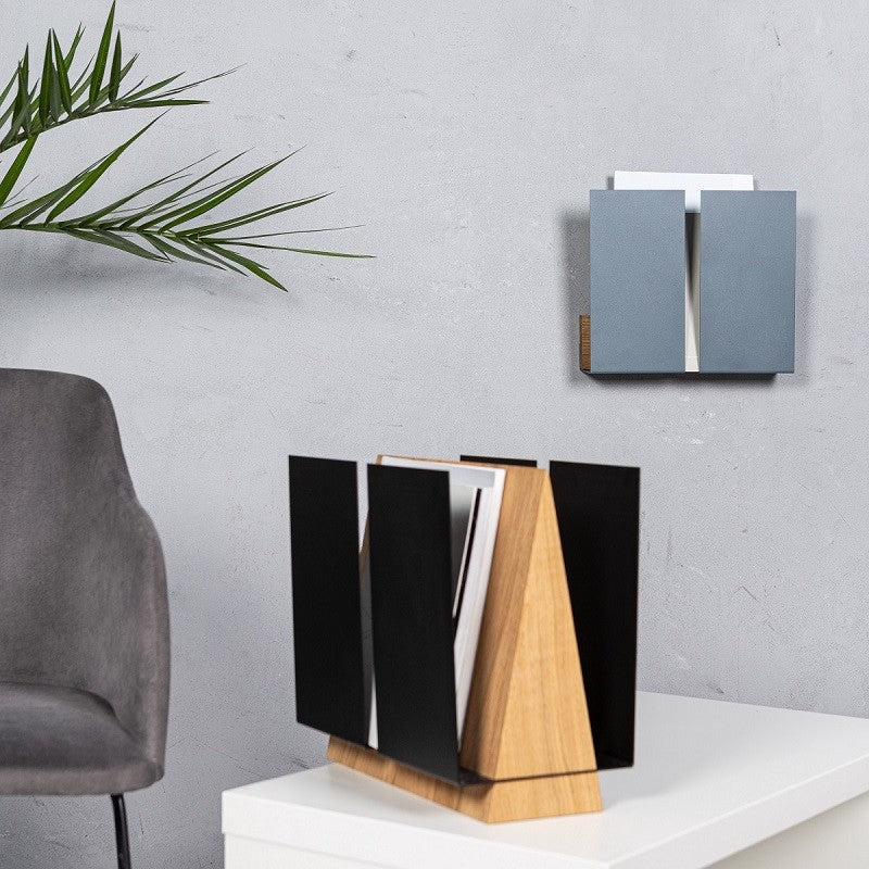 Black metal magazine stand