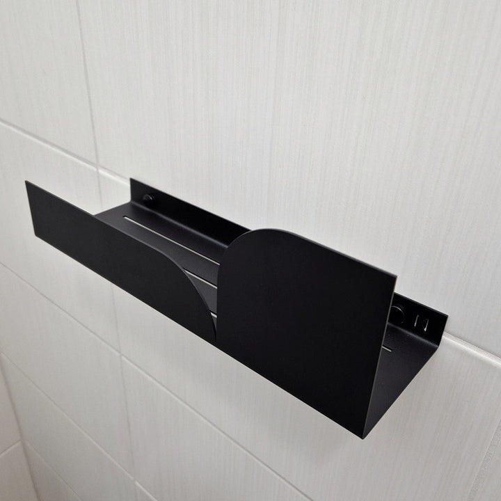 Black shower shelf made from metal