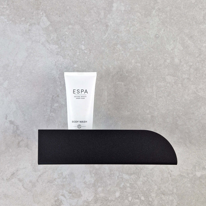 Small shower shelf from metal 