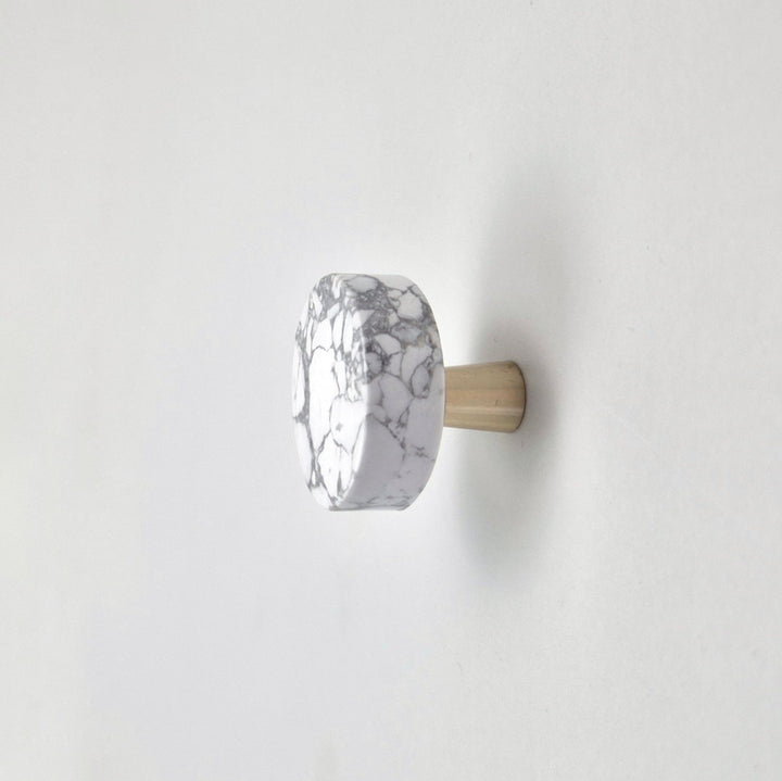 Round marble wall hook with brass detail