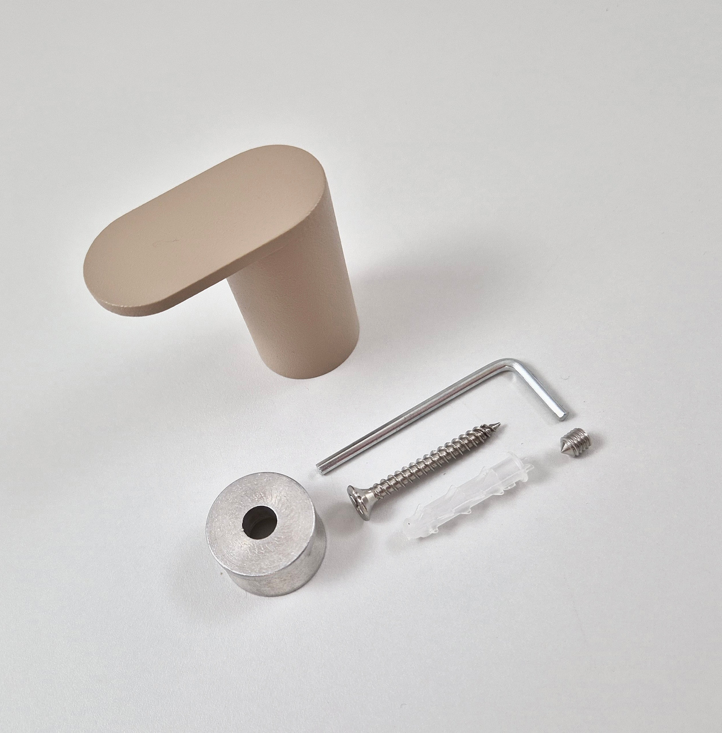 Minimalist wall hook parts including base, screw, and tools on a neutral background.
