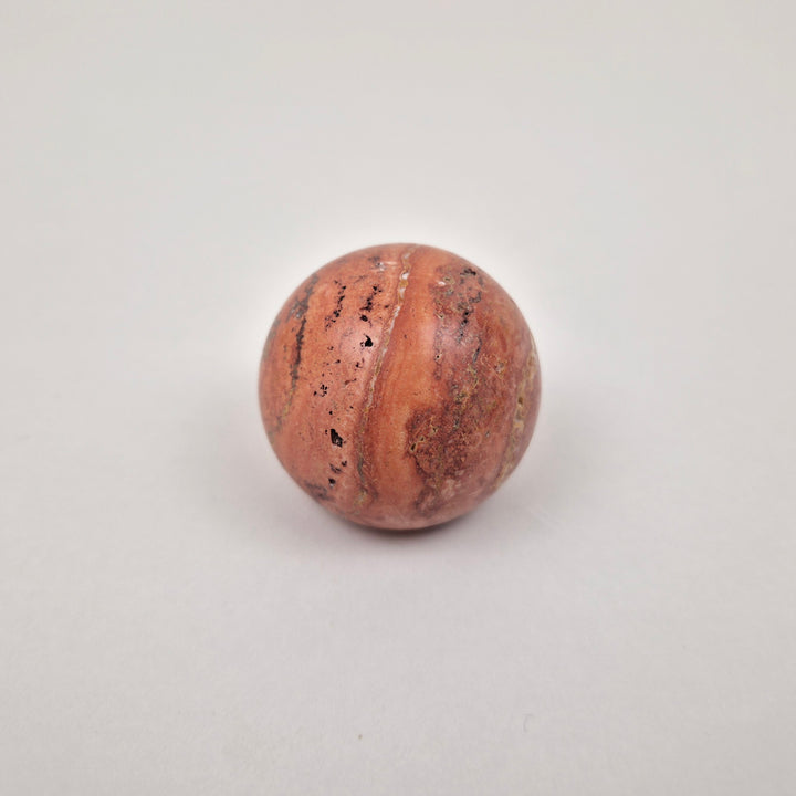 Natural Stone Cabinet Knob made of travertine showcasing unique textures and colors, perfect for kitchens and bathrooms.