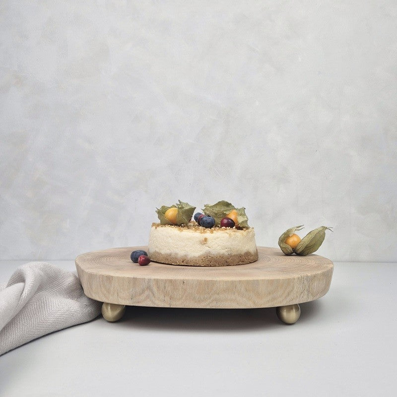 Wooden cake stand with brass legs