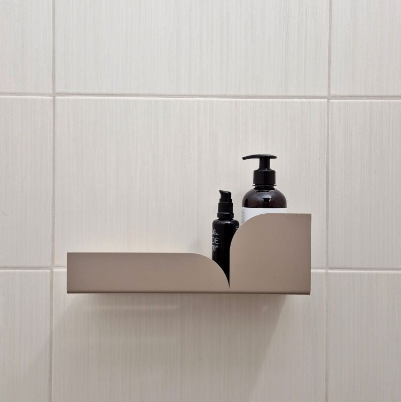 Beige metal shower shelf