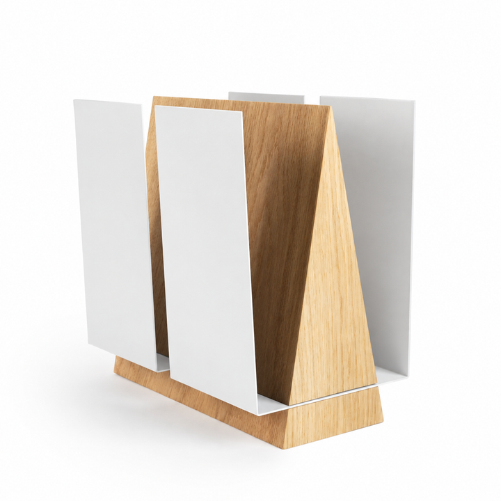 A modern magazine holder with white metal detail and oak wood. 