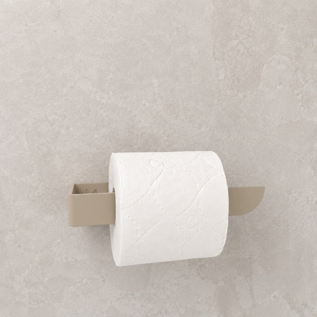 Adhesive beige toilet paper holder with white paper roll mounted on textured wall.