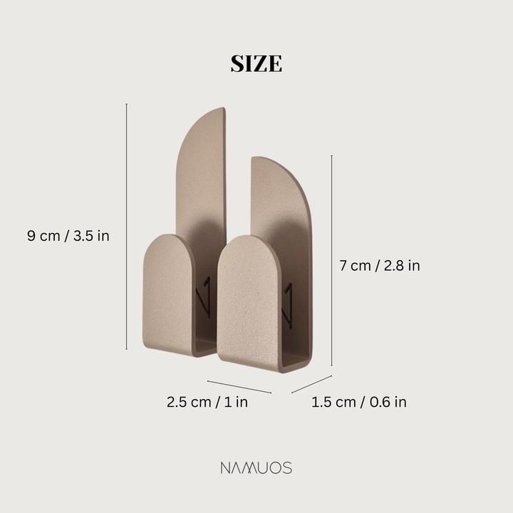 Size chart for Adhesive wall hooks showing dimensions in centimeters and inches.